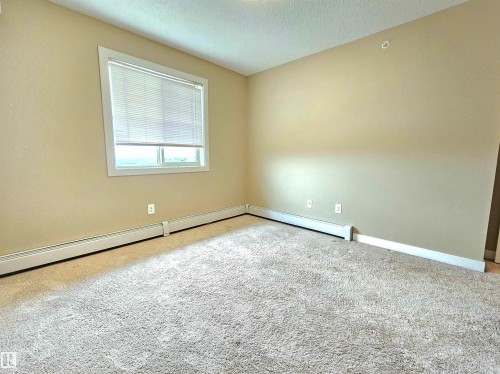406 1080 Mcconachie Boulevard, Edmonton, AB - Indoor Photo Showing Other Room