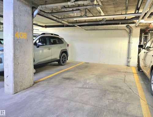 406 1080 Mcconachie Boulevard, Edmonton, AB - Indoor Photo Showing Garage