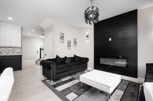 23 Hunter Place, Spruce Grove, AB - Indoor Photo Showing Living Room With Fireplace