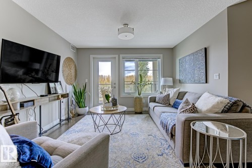 210 5029 Edgemont Boulevard, Edmonton, AB - Indoor Photo Showing Living Room