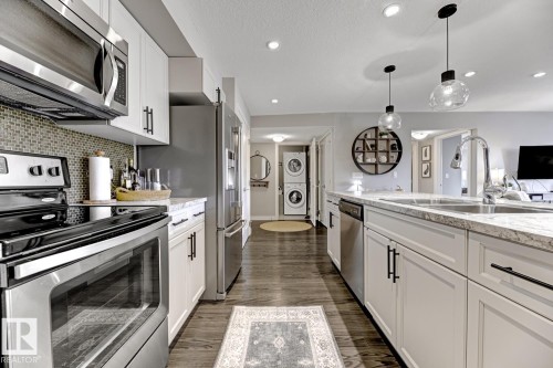 210 5029 Edgemont Boulevard, Edmonton, AB - Indoor Photo Showing Kitchen With Double Sink With Upgraded Kitchen