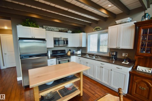 603 59201 Rng Road 95, Rural St. Paul County, AB - Indoor Photo Showing Kitchen With Double Sink