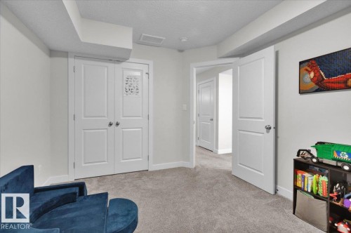 788 Berg Loop, Leduc, AB - Indoor Photo Showing Other Room