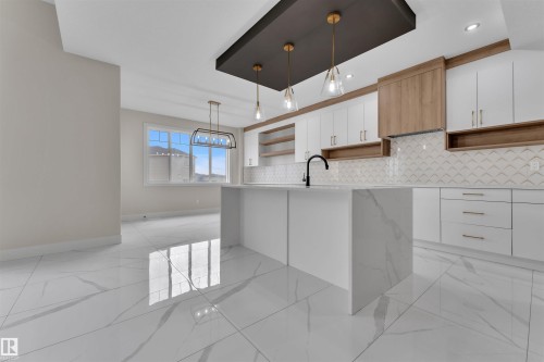 4311 35 Street, Beaumont, AB - Indoor Photo Showing Kitchen With Upgraded Kitchen