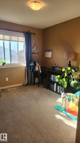 107 5420 Grant Macewan Boulevard, Leduc, AB - Indoor Photo Showing Other Room