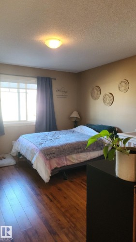 107 5420 Grant Macewan Boulevard, Leduc, AB - Indoor Photo Showing Bedroom