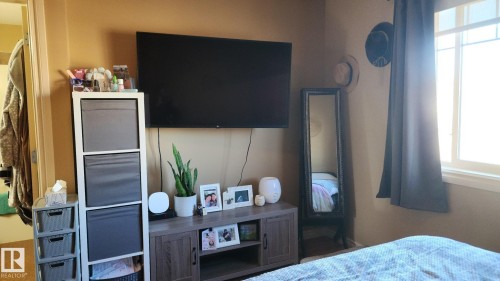 107 5420 Grant Macewan Boulevard, Leduc, AB - Indoor Photo Showing Bedroom