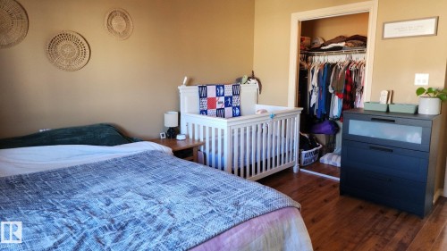 107 5420 Grant Macewan Boulevard, Leduc, AB - Indoor Photo Showing Bedroom