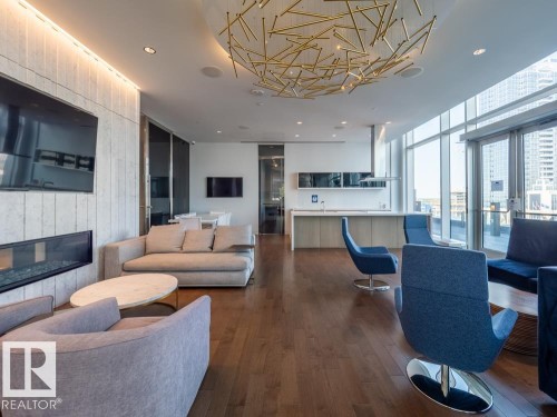 4402 10360 102 Street, Edmonton, AB - Indoor Photo Showing Living Room With Fireplace