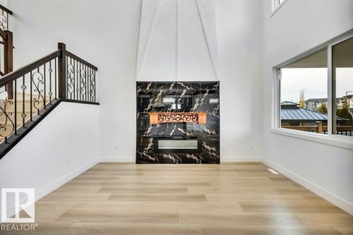 11010 174A Avenue, Edmonton, AB - Indoor Photo Showing Other Room With Fireplace