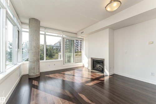 207 2612 109 Street, Edmonton, AB - Indoor Photo Showing Living Room With Fireplace