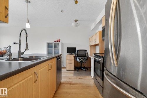 203 13908 136 Street, Edmonton, AB - Indoor Photo Showing Kitchen With Stainless Steel Kitchen With Double Sink