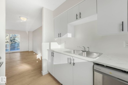 5833 Riverbend Road, Edmonton, AB - Indoor Photo Showing Kitchen With Double Sink