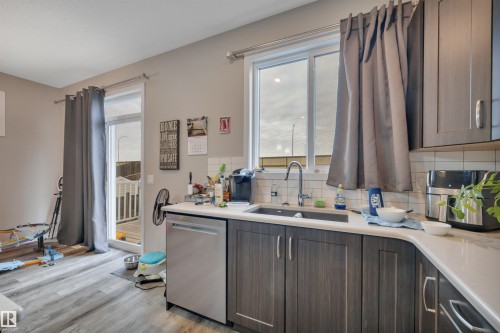 213 Sturtz Bend, Leduc, AB - Indoor Photo Showing Kitchen With Double Sink