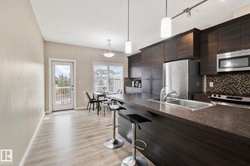 28 3710 Allan Drive, Edmonton, AB - Indoor Photo Showing Kitchen With Stainless Steel Kitchen With Double Sink With Upgraded Kitchen