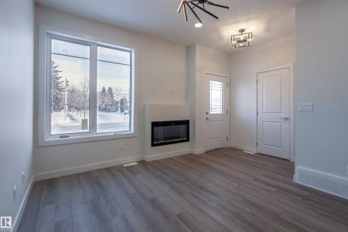 10446 142 Street, Edmonton, AB - Indoor Photo Showing Living Room With Fireplace