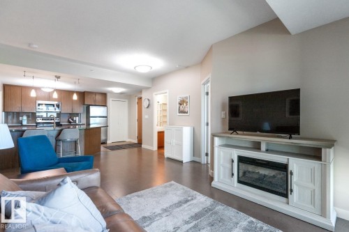 607 10055 118 Street, Edmonton, AB - Indoor Photo Showing Living Room With Fireplace