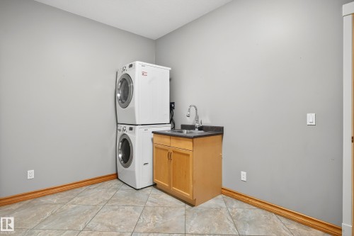 18 Briarwood Village, Stony Plain, AB - Indoor Photo Showing Laundry Room