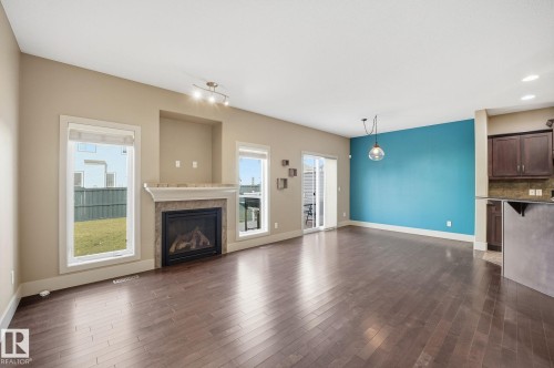 46 1901 126 St Sw, Edmonton, AB - Indoor Photo Showing Living Room With Fireplace