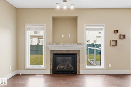 46 1901 126 St Sw, Edmonton, AB - Indoor Photo Showing Living Room With Fireplace