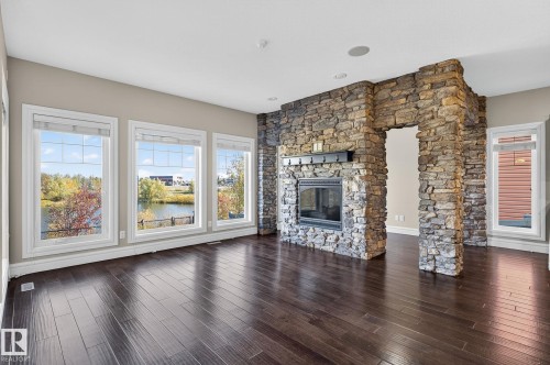3841 Gallinger Loop, Edmonton, AB - Indoor Photo Showing Living Room With Fireplace