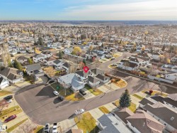 Aerial view of property's location featuring nearby suburban area - 