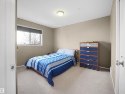 Bedroom with carpet and baseboards - 