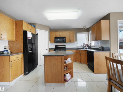94 Dechene Road, Edmonton, AB - Indoor Photo Showing Kitchen With Double Sink