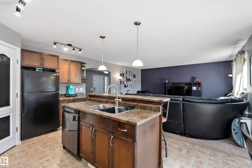 143 Acacia Circle, Leduc, AB - Indoor Photo Showing Kitchen With Double Sink