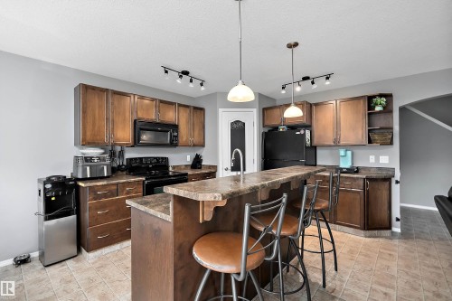 143 Acacia Circle, Leduc, AB - Indoor Photo Showing Kitchen With Double Sink