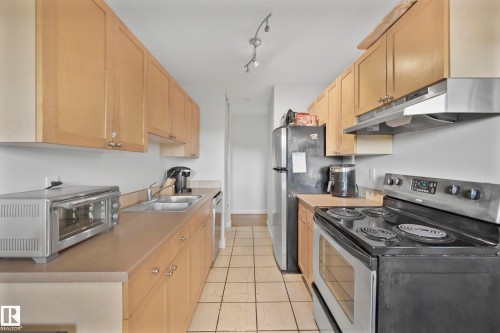205 10917 109 Street Nw, Edmonton, AB - Indoor Photo Showing Kitchen With Double Sink