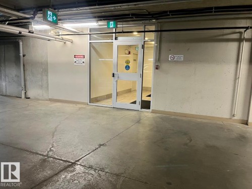 407 12804 140 Avenue, Edmonton, AB - Indoor Photo Showing Garage