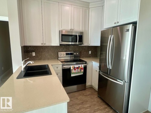 407 12804 140 Avenue, Edmonton, AB - Indoor Photo Showing Kitchen With Double Sink
