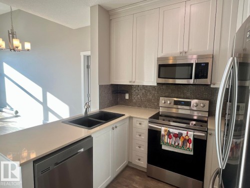 407 12804 140 Avenue, Edmonton, AB - Indoor Photo Showing Kitchen With Double Sink