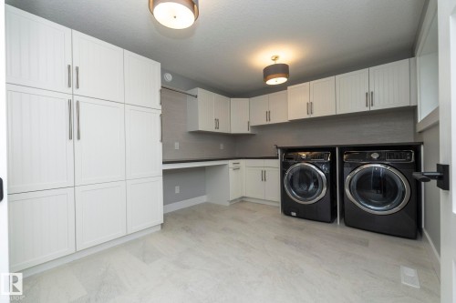 7549 May Common, Edmonton, AB - Indoor Photo Showing Laundry Room