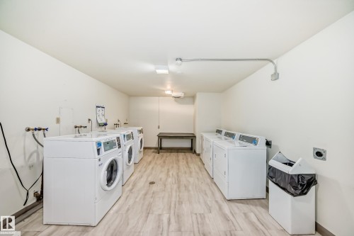 417 8604 Gateway Boulevard, Edmonton, AB - Indoor Photo Showing Laundry Room
