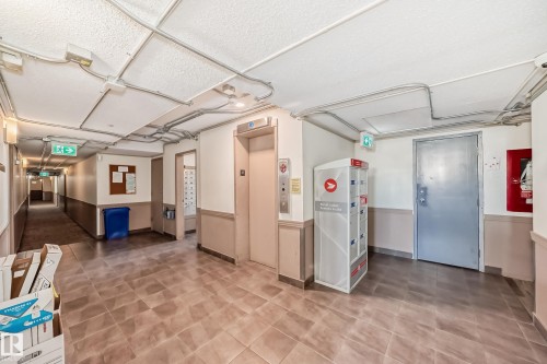 417 8604 Gateway Boulevard, Edmonton, AB - Indoor Photo Showing Laundry Room