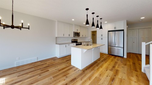 98 Baker Street, Ardrossan, AB - Indoor Photo Showing Kitchen With Stainless Steel Kitchen