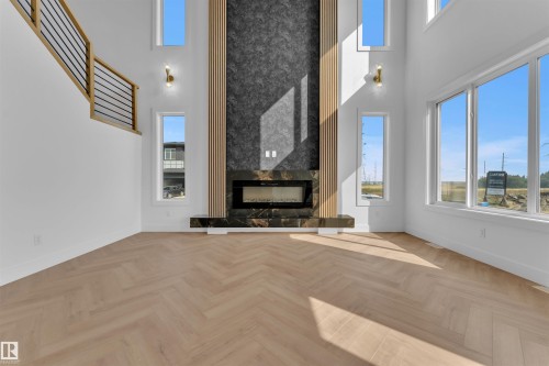 103 28 Street, Edmonton, AB - Indoor Photo Showing Other Room With Fireplace
