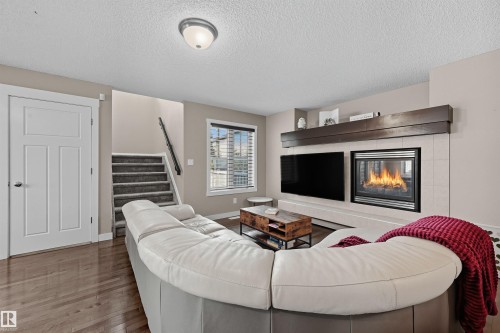 2608 Anderson Crescent, Edmonton, AB - Indoor Photo Showing Living Room With Fireplace