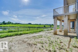 View of yard with a patio area and a view of rural / pastoral area - 