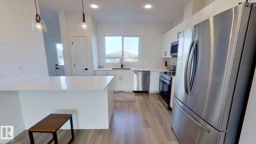 54 Sienna Boulevard, Fort Saskatchewan, AB - Indoor Photo Showing Kitchen With Upgraded Kitchen