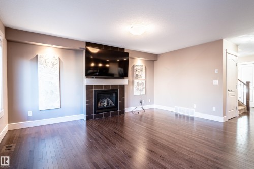 623 176 Street, Edmonton, AB - Indoor Photo Showing Living Room With Fireplace
