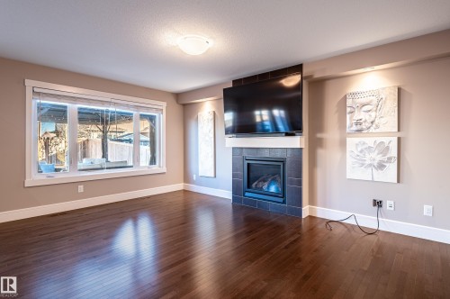 623 176 Street, Edmonton, AB - Indoor Photo Showing Living Room With Fireplace