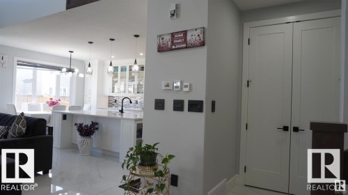 Hall featuring a chandelier - 707 180 Street, Edmonton, AB - Indoor