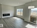 Upper 319 33 Avenue, Edmonton, AB  - Indoor Photo Showing Living Room With Fireplace 