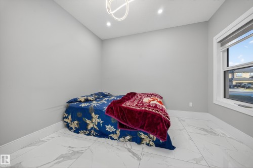 4406 Triomphe Close, Beaumont, AB - Indoor Photo Showing Bedroom