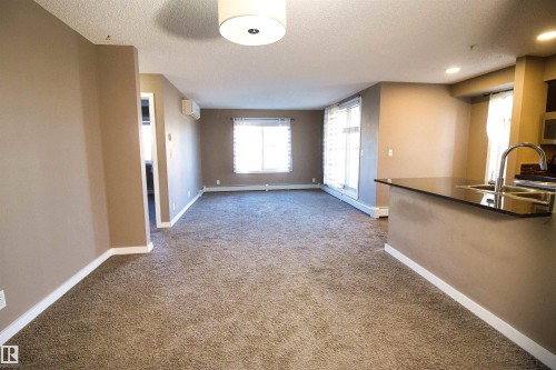 124 12025 22 Avenue, Edmonton, AB - Indoor Photo Showing Other Room