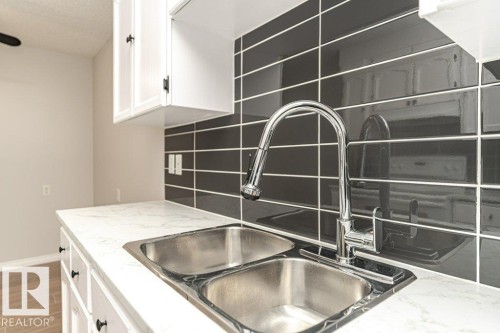 204 14004 26 Street, Edmonton, AB - Indoor Photo Showing Kitchen With Double Sink