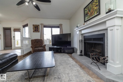 12 Elsinore Place, Edmonton, AB - Indoor Photo Showing Living Room With Fireplace